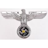 A Third Reich polished cast aluminium wall eagle, wingspan 15" (38cm), the back with small