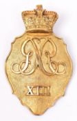 An officer’s shako plate, 1812 pattern, of the 13th Regiment, interlaced “GR” above “XIII”. Very