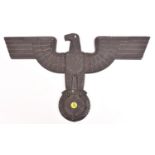 A Third Reich cast aluminium alloy wall eagle, wingspan 19½” (49.5cms), with stubby square tipped