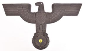 A Third Reich cast aluminium alloy wall eagle, wingspan 19½” (49.5cms), with stubby square tipped