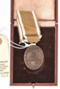 A Third Reich West Wall medal, in original case. GC £50-70.