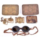 2 WWI Princess Mary brass Christmas 1914 gift tins; a pair of goggles in tin; a Royal Artillery gilt