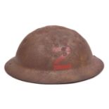 A WWI raw edge Brodie’s pattern steel helmet, red painted black letter “Z” (Channel Islands ?),