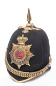 A Victorian officer’s home service pattern blue cloth helmet of the Royal Berkshire Regiment, mounts