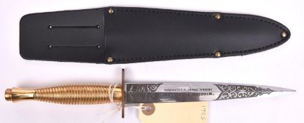 A WWII commemorative FS fighting knife, blade etched “Mission Fulfilled” etc. VGC £70-80