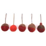 5 woollen ball plumes for 19th century shakos, comprising 4 dark red over grey and one small