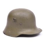 A WWI Imperial German Army steel helmet, GC (replacement lining and old repaint) £100-120.