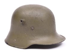 A WWI Imperial German Army steel helmet, GC (replacement lining and old repaint) £100-120.