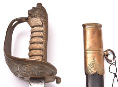 A post 1902 Royal Naval officer’s sword, blade 31" etched with Royal Arms, crown, anchor and foliage