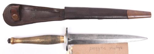 A WWII 2nd Pattern FS fighting knife, blade etched with “Wilkinson Sword London and the FS