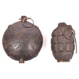 A WWI No 5 Mk I inert hand grenade, complete but heavily rusted overall; also an inert WWI German “