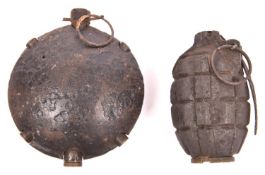A WWI No 5 Mk I inert hand grenade, complete but heavily rusted overall; also an inert WWI German “