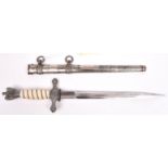 A Third Reich late war Naval officer’s dagger, with unmarked blade, grey metal hilt mounts and