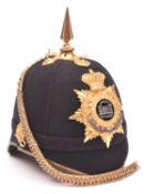 A Vic officer’s blue cloth spiked helmet of The Dorsetshire Regt, gilt top mount and spike, peak