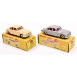 2 Dinky Toys Jaguar 3.4 Litre Saloon (195). An example in light grey and another in cream, both with
