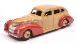 Dinky Toys 39 Series Chrysler Royal sedan (39e). A U.S. export example in tan, with red wings, tan