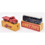 2 Dinky Toys. B.O.A.C. Coach (283). In dark blue and white livery, with mid blue wheels. Plus a