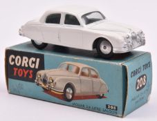 Corgi Toys Jaguar 2.4 Litre Saloon (208). An early example in white with no interior or