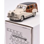 Kenna white metal Austin A70 Estate. An example in white with black roof and wood effect sides.