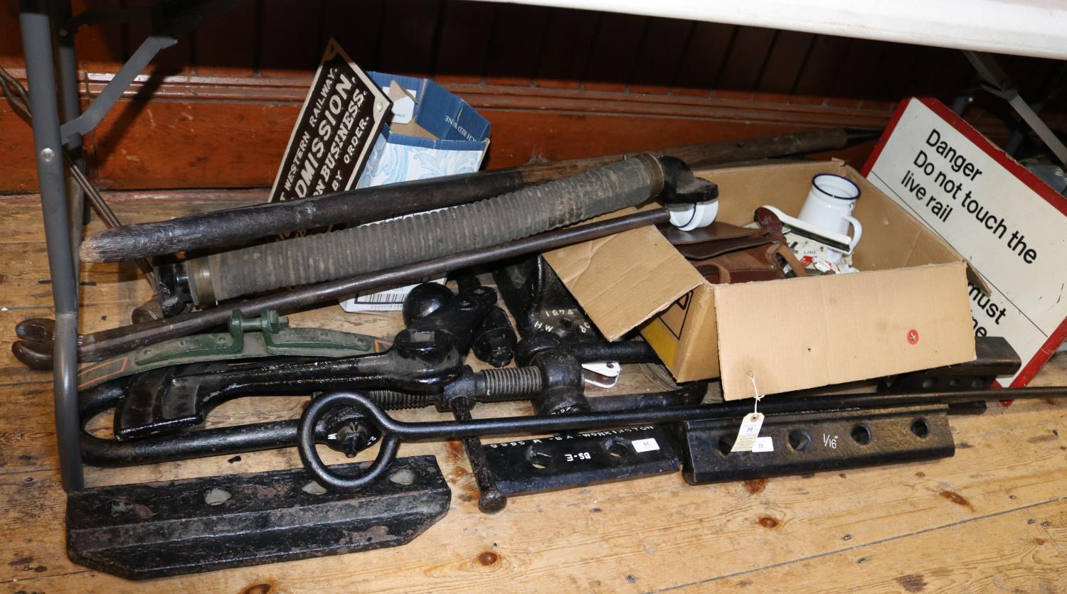 A quantity of Railwayana. Including cast iron items; fish plates, vacuum brake hose, track spanner