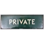 A BR enamelled station sign; PRIVATE. White lettering on green background. Mead McLean & Co.