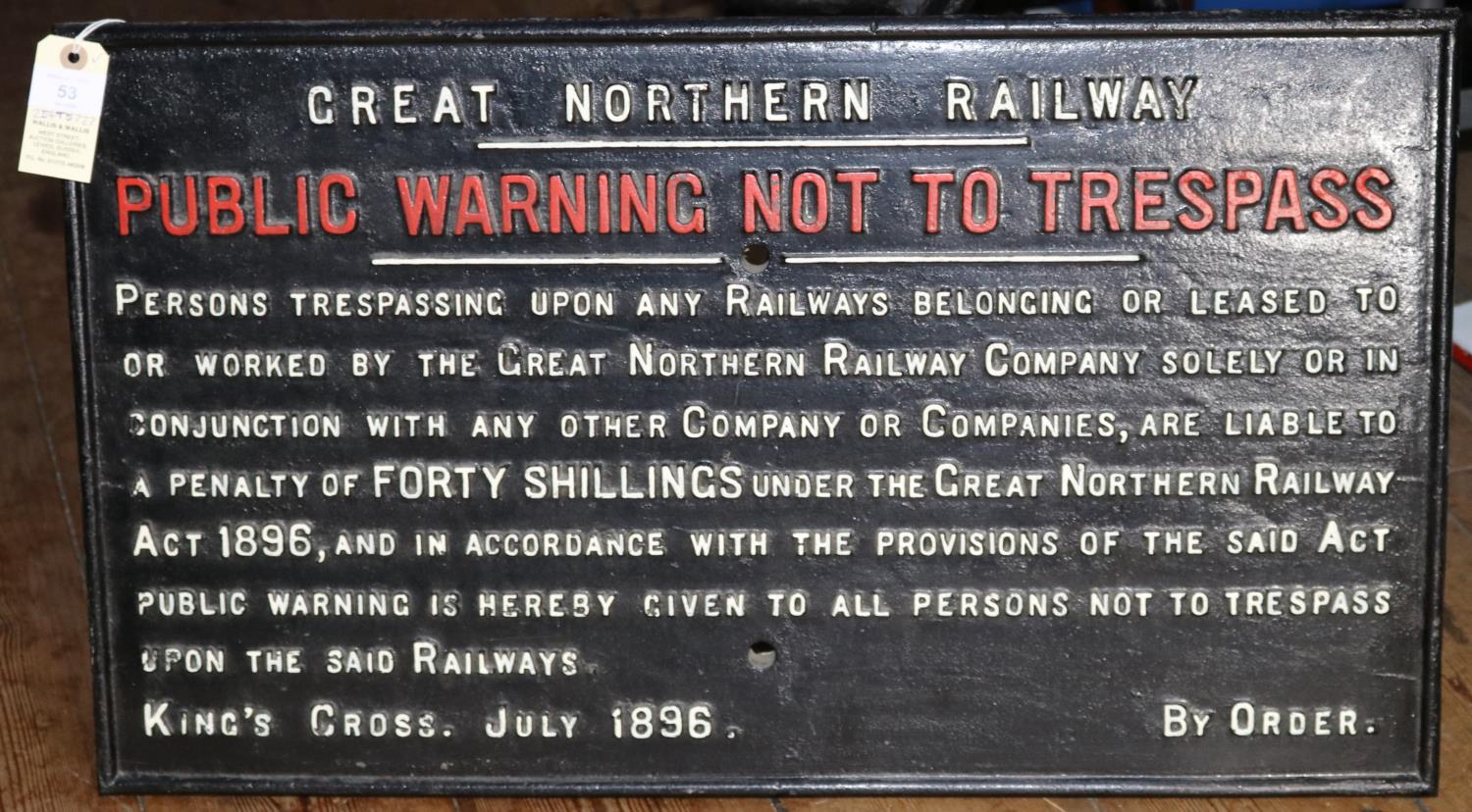 A GNR cast iron sign. Great Northern Railway 'Public Warning Not To Trespass' sign. King's Cross