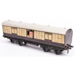 A Gauge One railway Carette LNWR Full Brake bogie van. 1332, in lined chocolate and cream livery