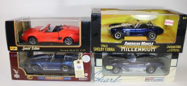 4 1:18 scale cars. UT Models Chevrolet Corvette Mako Shark in dark blue/shadow white. Road Legends