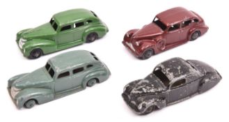 4 Dinky Toys 39 Series. Buick Viceroy (39d). An early pre-war example in maroon with black smooth