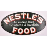 An oval enamelled advertising sign; Nestle's Food, An entire Diet for Infants & Invalids. On a