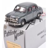 A Pathfinder Models 1954 Morris Oxford Series II saloon (PFM20). An example in dark grey. With