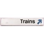 A late BR enamel sign; 'Trains'. Black lettering, blue arrow and white background. GC-VGC, some