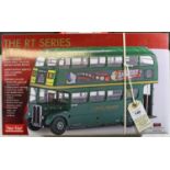 A Sun Star 1:24 scale London Transport 1955 AEC RT36 (FXT 211) in green (2922). Garage HG3,