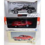 3 1:18 scale cars. 2x Autoart- Experimental Chevrolet Corvette Stingray in deep red. Plus a Ford