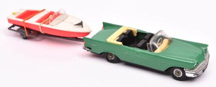 Scarce early 1960's plastic NOREV Chrysler New Yorker and sports boat. Car in green with black