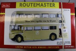 A Sun Star 1:24 scale London Transport Routemaster in gold. RM1983, Garage TH179, destination