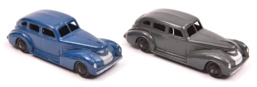 2 Dinky Toys 39 Series Chrysler Royal sedan (39e). An example in dark grey with black ridged wheels,