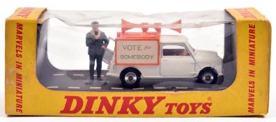 A Dinky Toys Election Mini Van (492). In white with orange framework with loud speakers and