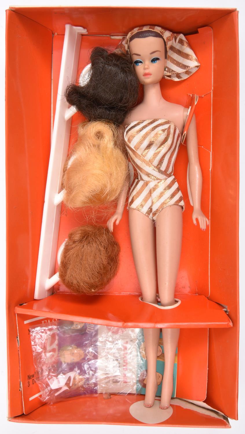 A Barbie Fashion Queen by Mattel (870). A 1962 issue Barbie with moulded head and hair, blue eye