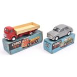 2 Corgi Toys A Morris Cowley Saloon (202). An example in light grey with smooth spun wheels and