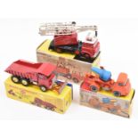 3 Dinky Toys. Foden Dump Truck, with bulldozer blade (959). In red with silver chassis, yellow