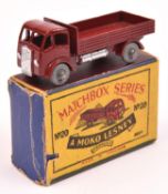 A Matchbox Series ERF Stake Truck (20a). An example in maroon with silver trim and metal wheels.