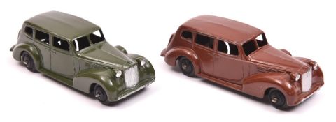 2 Dinky Toys 39 Series. Packard Super Eight (39a). An example in dark brown with ridged black wheels