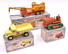 3 Dinky Supertoys. Blaw Knox Heavy Tractor (963). An example in orange with green wheels and green