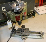 A miniature 1960s milling machine by Emco Uni mat. Approx length of base 370mm. QGC-GC, evidence