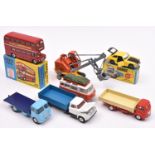 6 Corgi Toys. London Transport Routemaster Bus (468). In red L.T. livery. Plus an MGC GT (345) in