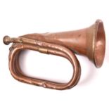 A WWII British army copper bugle, marked “21 PTC Besson & Co, London 1940” and broad arrow. GC (