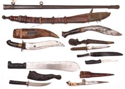 A Gurkha kukri; a West African sword in sheath; a machete, 5 other knives and a Vic sword