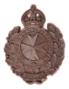 A very scarce WWII economy plastic badge of the King’s Own Malta Regiment, made by A. Stanley &