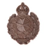 A very scarce WWII economy plastic badge of the King’s Own Malta Regiment, made by A. Stanley &